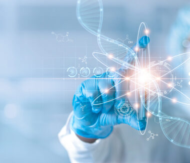 Masked researcher's gloved hand over transparent DNA strand on glass