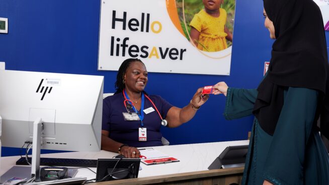 Blood donor registering to make blood donation at MBC donation center.